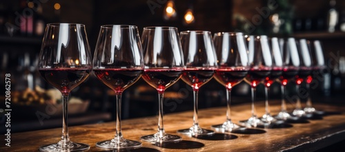 Elegant Wine Glasses on Vintage Table AI Generated photo