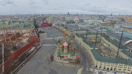 Townscape with crowd of tourists on red square near GUM mall