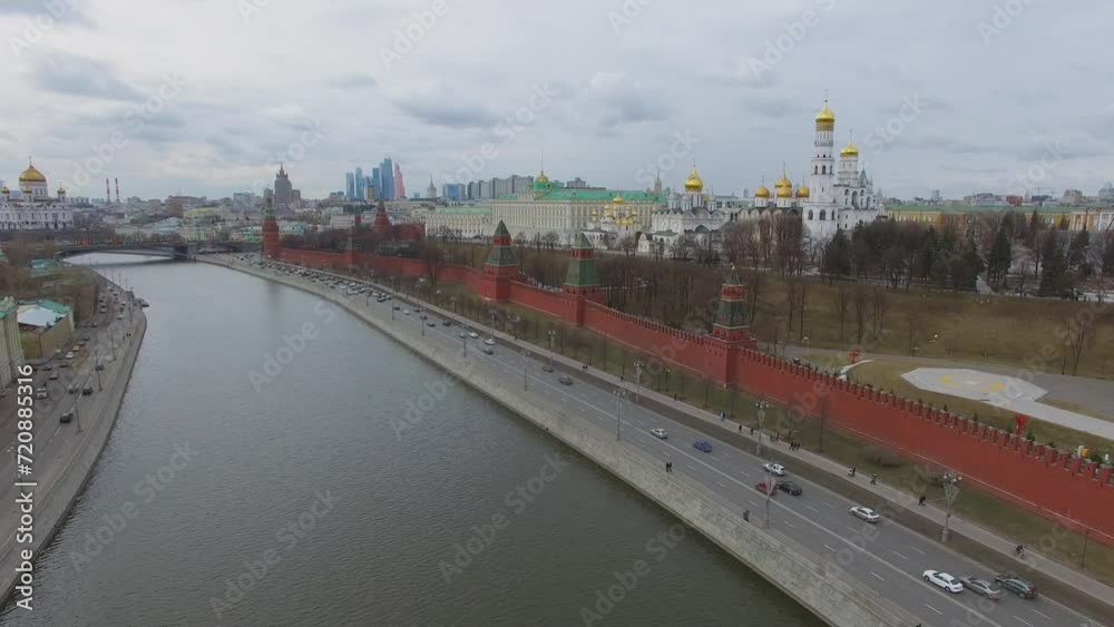 Embankments of Moskva river with traffic near Kremlin complex Embankments of Moskva river with traffic near Kremlin complex