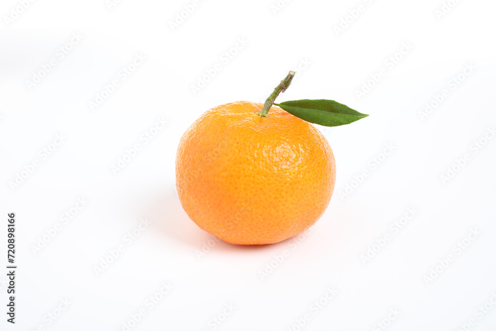 Fresh ripe tangerine with leaf isolated on white. Citrus fruit Fresh ripe tangerine with leaf isolated on white. Citrus fruit