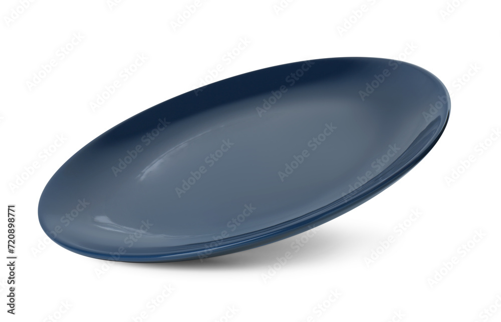 One beautiful navy blue plate isolated on white One beautiful navy blue plate isolated on white
