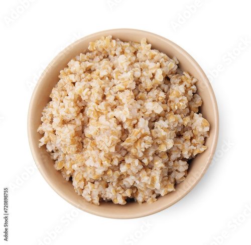 Tasty wheat porridge in bowl isolated on white, top view