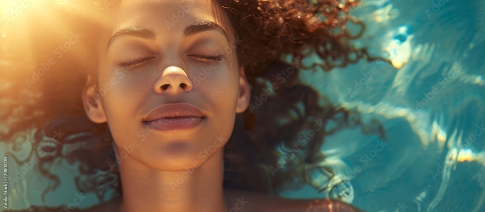 Close-Up of Young Woman Enjoying Sun: A Captivating Close-Up Shot of a Young Woman Blissfully Soaking in the Sun