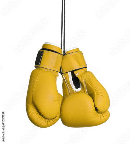 Pair of yellow boxing gloves isolated on white © New Africa