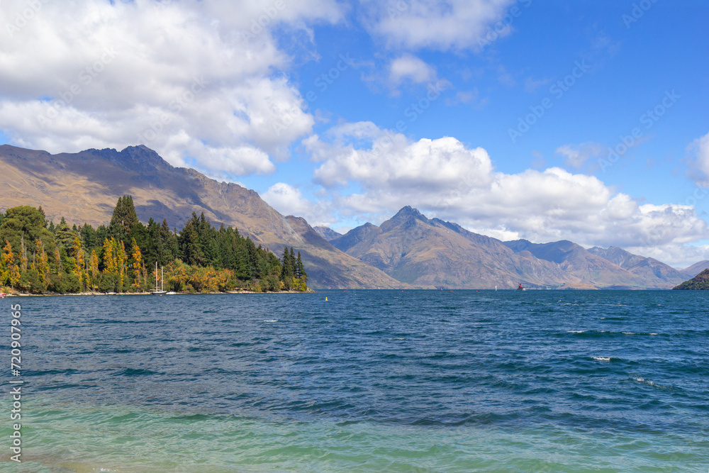 Wakatipu lake in sunny autumn day