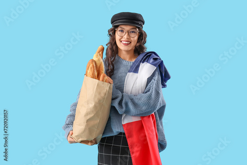 Young Asian woman with flag...