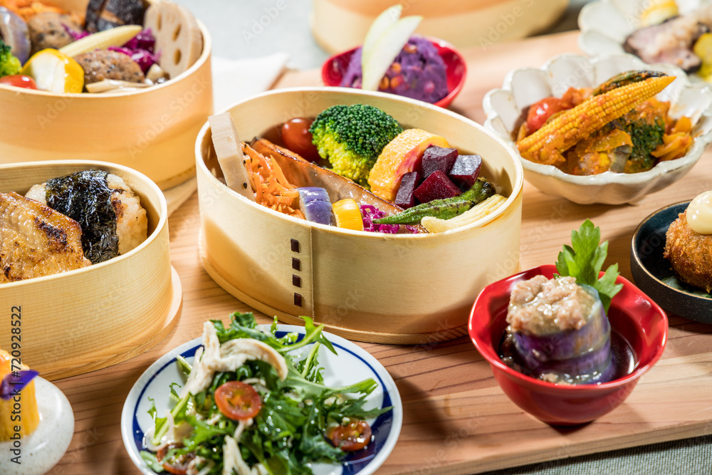 Japanese food in bamboo containers, closeup of a Japanese meal. Japanese food in bamboo containers, closeup of a Japanese meal.