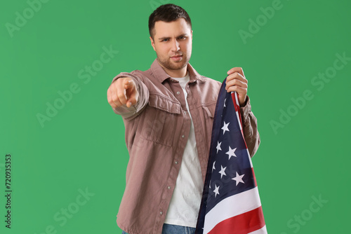Young man with USA flag poi...