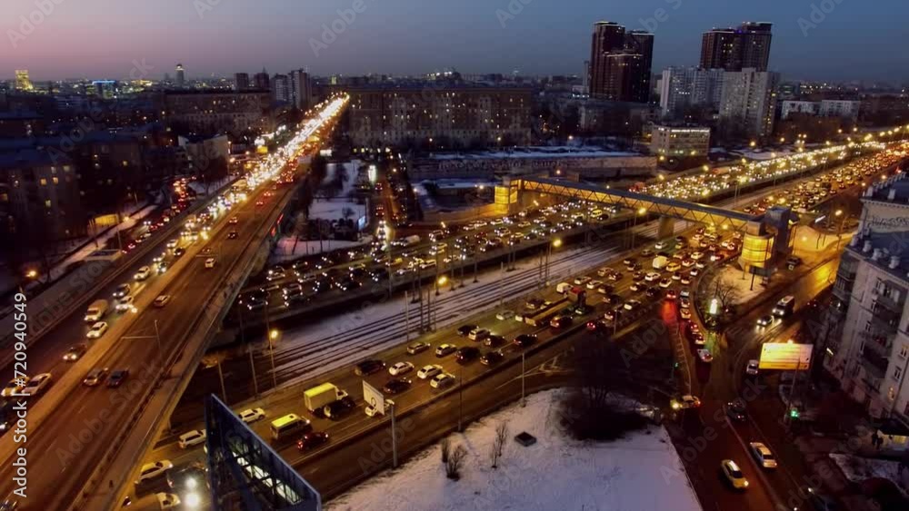 City highway with traffic jam at winter evening. Aerial view City highway with traffic jam at winter evening. Aerial view