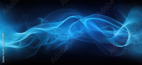 A swirling blue smoke creates mesmerizing patterns against a black background.