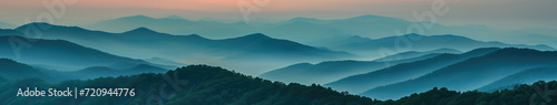 Sunset or sunrise panorama of smoky mountain ridges banner, landscape, scenery.