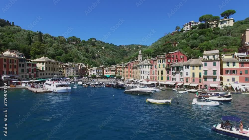 Many boats are in Marina of Portofino near coastal town at summer Many boats are in Marina of Portofino near coastal town at summer