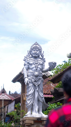 Panglipuran Village, Bali, Indonesia - January 20, 2024: Close up photo of the statue in Panglipuran village