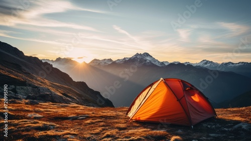 Tent in the mountains at sunset. Dramatic and picturesque scene. Generative AI