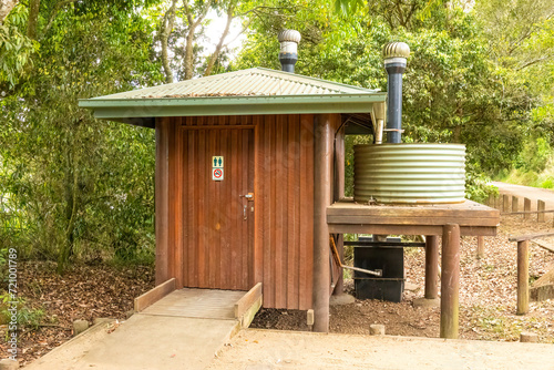 An environmentally friendly public toilet structure with a sealed unit and water tank at Hastie's Swamp on the Atherton Tablelands in Queensland, Australia. photo