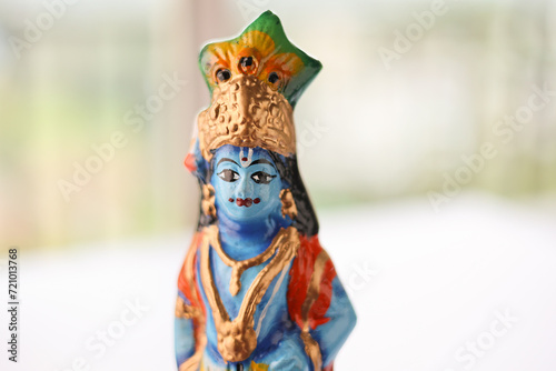 Sri Krishna statue with peacock feather. Lord Krishna Standing with Flute