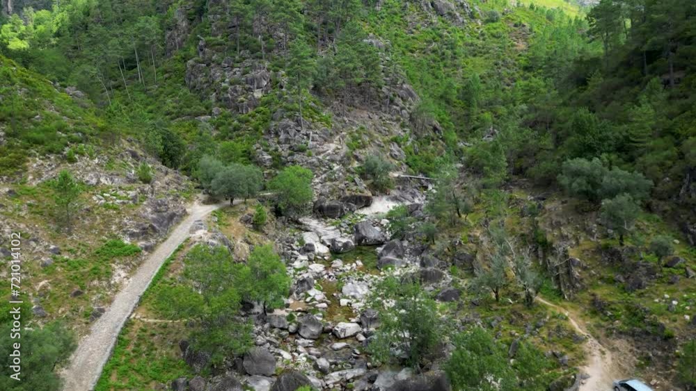 Aerial Sightseeing over Fafião, Montalegre, and Gerês Rivers and Bridges in the National Park of Northern Portugal on a Sunny Day Aerial Sightseeing over Fafião, Montalegre, and Gerês Rivers and Bridges in the National Park of Northern Portugal on a Sunny Day