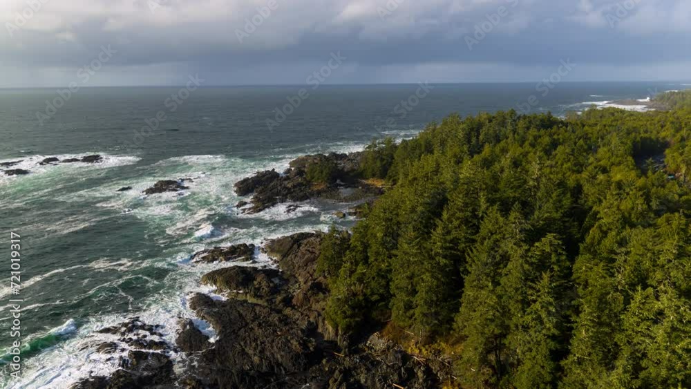 Drone video at sunset in Ucluelet British Columbia, Canada over the ocean and forest Drone video at sunset in Ucluelet British Columbia, Canada over the ocean and forest