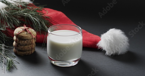 A glass of milk and cookies set out for Santa Claus, with copy space