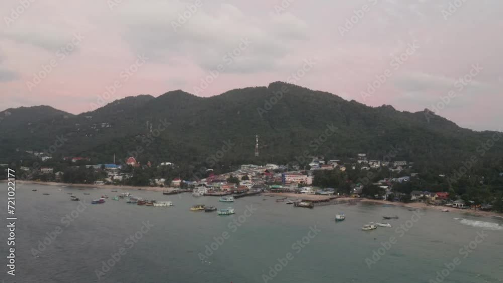Aerial View Over Koh Tao Pier And Island With Boats Moored In Ocean. Parallax Shot Aerial View Over Koh Tao Pier And Island With Boats Moored In Ocean. Parallax Shot