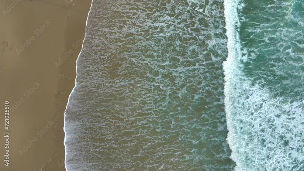 Aerial Of Foamy Sea Water Rolling On Sandy Coast - Drone Shot Aerial Of Foamy Sea Water Rolling On Sandy Coast - Drone Shot