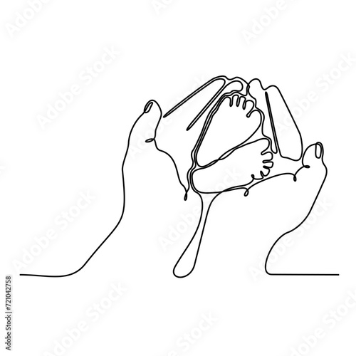 continuous line of mother's hands and baby's feet
