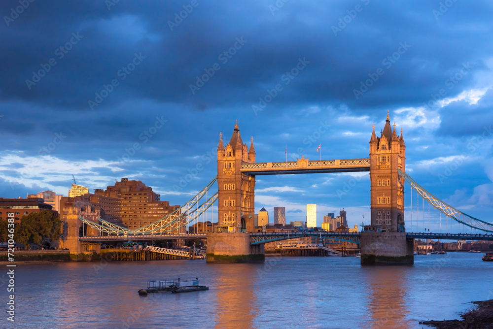 Tower Bridge in London at sunset. This is one of the oldest bridges and landmarks and a popular tourist attraction.