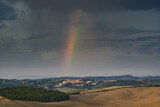 Pitoresque region Tuscany, rainbow over the valley, Italy.