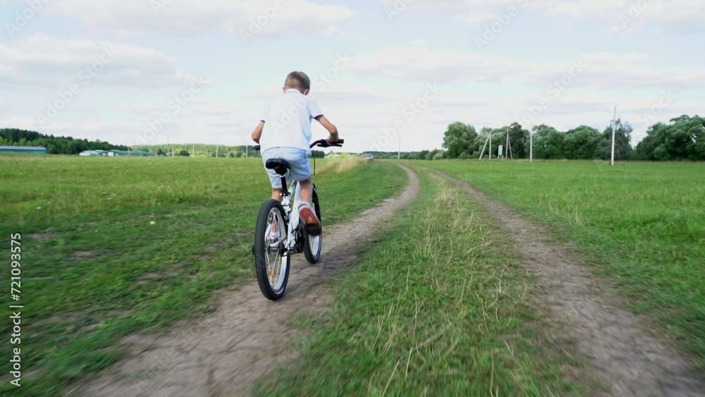 a boy with his mother learns to ride a bike a boy with his mother learns to ride a bike