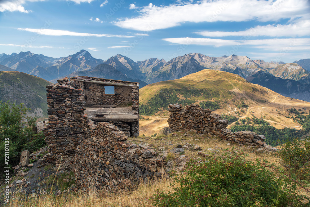 Mountain landscape with an old house destroyed in stone at l'Alpe d'Huez in France