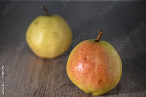 two juicy pears on a wooden table, studio shooting 3