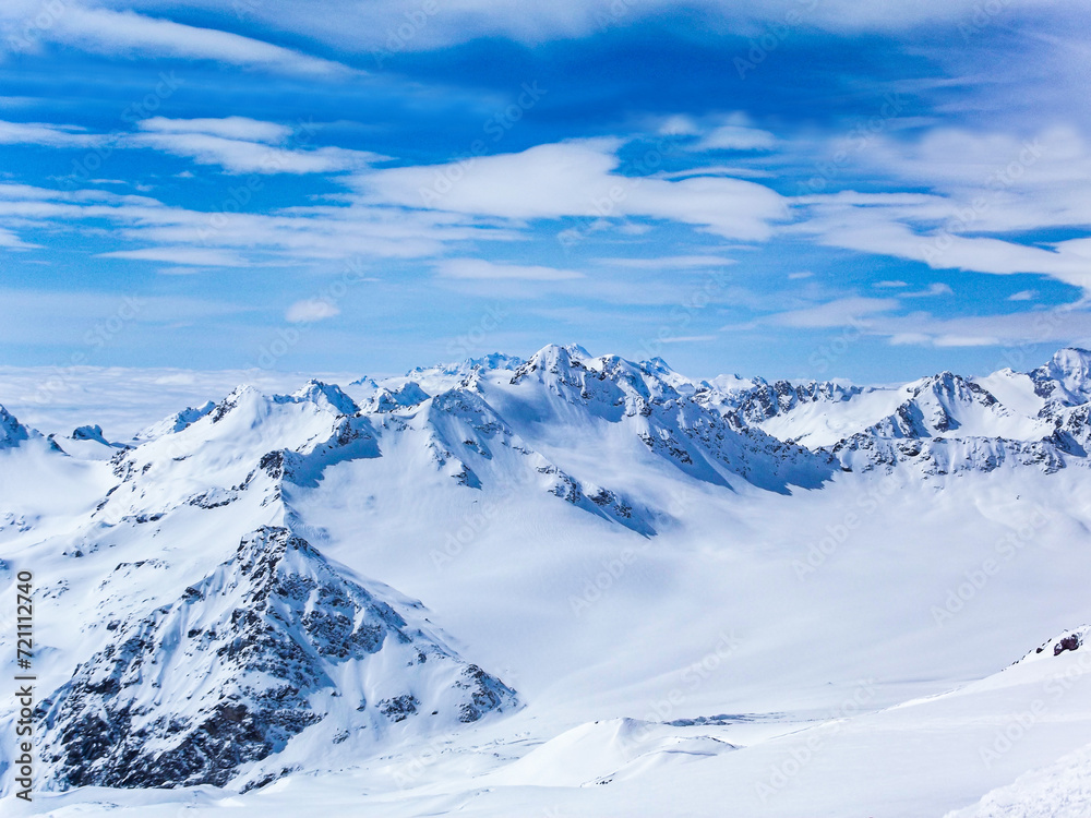 Winter mountains, white snow-capped mountain peak. Mountains of the North Caucasus.