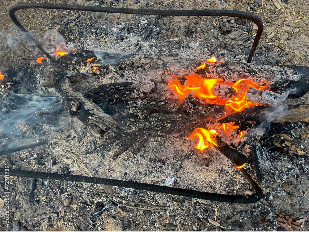 a barbecue campfire is built in the forest a barbecue campfire is built in the forest