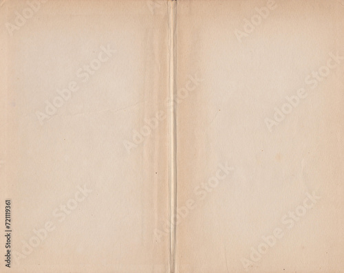 Book spread with old pages. Vintage paper texture. Kraft paper texture with stains, grain, dust particles. Aged overlay effect background with high resolution. Empty abstract backdrop design