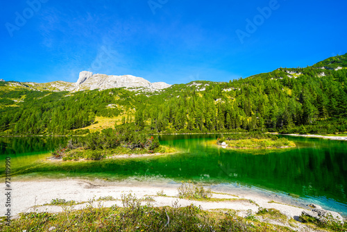 Steirersee on the high plateau of the Tauplitzalm. View of the lake at the Toten Gebirge in Styria. Idyllic landscape with mountains and a lake on the Tauplitz in Austria.
 photo