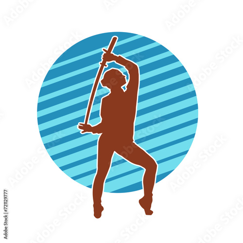 Silhouette of a female fighter in action pose carrying sword weapon.