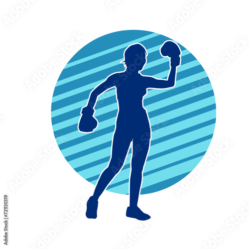 Silhouette of woman boxing athlete in action pose. Silhouette of a female wearing boxing gloves for boxing sport.