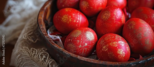 Orthodox Greek tradition of cracked red Easter eggs symbolizes Christ's resurrection. photo