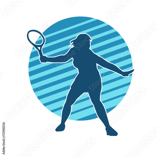 Silhouette of a female tennis player in action pose. Silhouette of a woman playing tennis sport with racket.