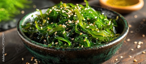Seaweed Salad is a nutritious snack with sesame seeds and seaweed. photo