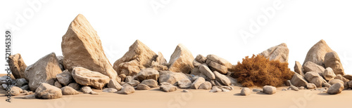 Varied rock formations arranged on a smooth sand surface, cut out photo