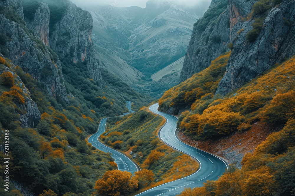 Aerial photograph of a mountain pass with winding roads, showcasing ...