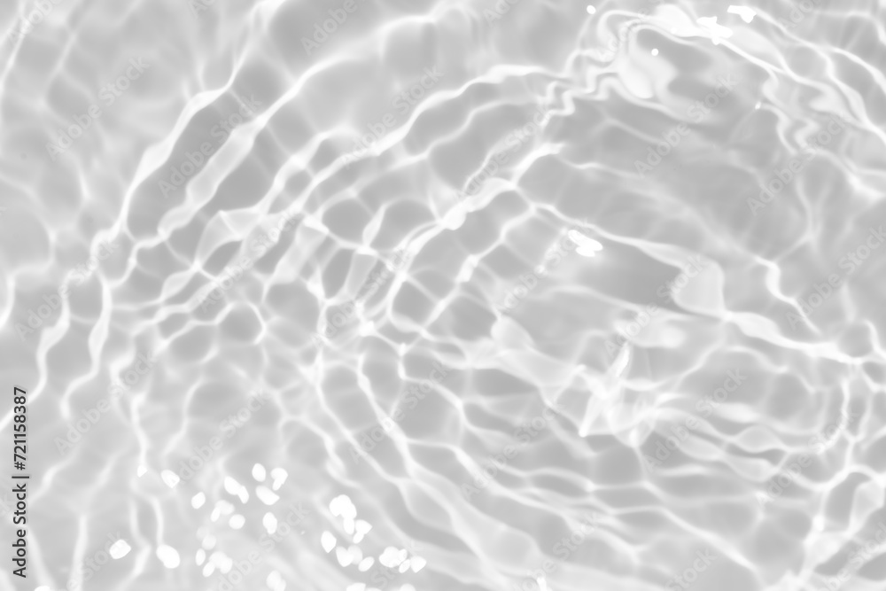 White water with ripples on the surface. Defocus blurred transparent white colored clear calm water surface texture with splashes and bubbles. Water waves with shining pattern texture background. White water with ripples on the surface. Defocus blurred transparent white colored clear calm water surface texture with splashes and bubbles. Water waves with shining pattern texture background.