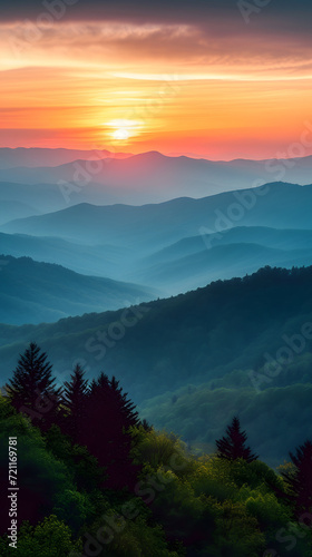 sunset over misty mountains