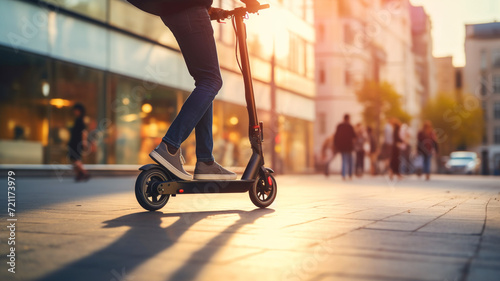 close up of a person driving e-scooter in a urban city street in the morning.