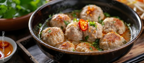 Bowl of Bakso: Irresistible Meatballs Served in a Delicious Bowl of Bakso photo