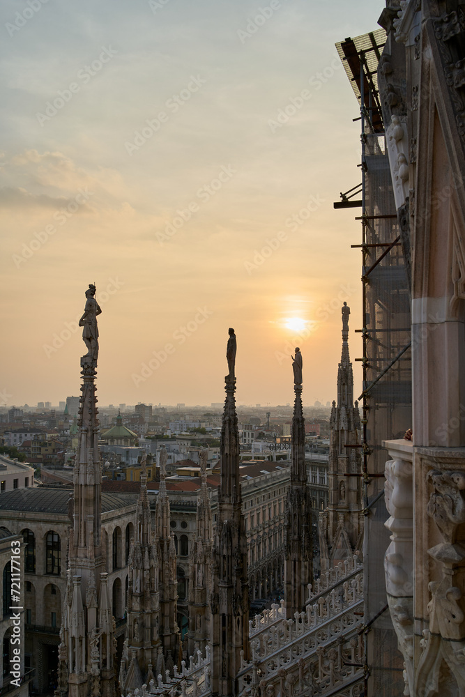 Sunset as seen from the top of Duomo di Milano (Milan Cathedral) in Milan, Italy