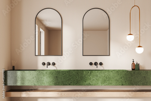 Beige bathroom interior with double sink