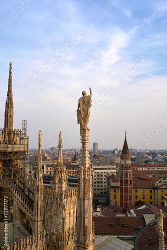 Dusk over Mila as seen from the Duomo di Milano (Milan Cathedral) in Milan, Italy photo