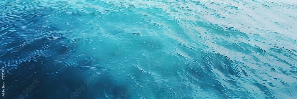 Obraz premium aerial view of the ocean surface, Calm blue waters seen from above 